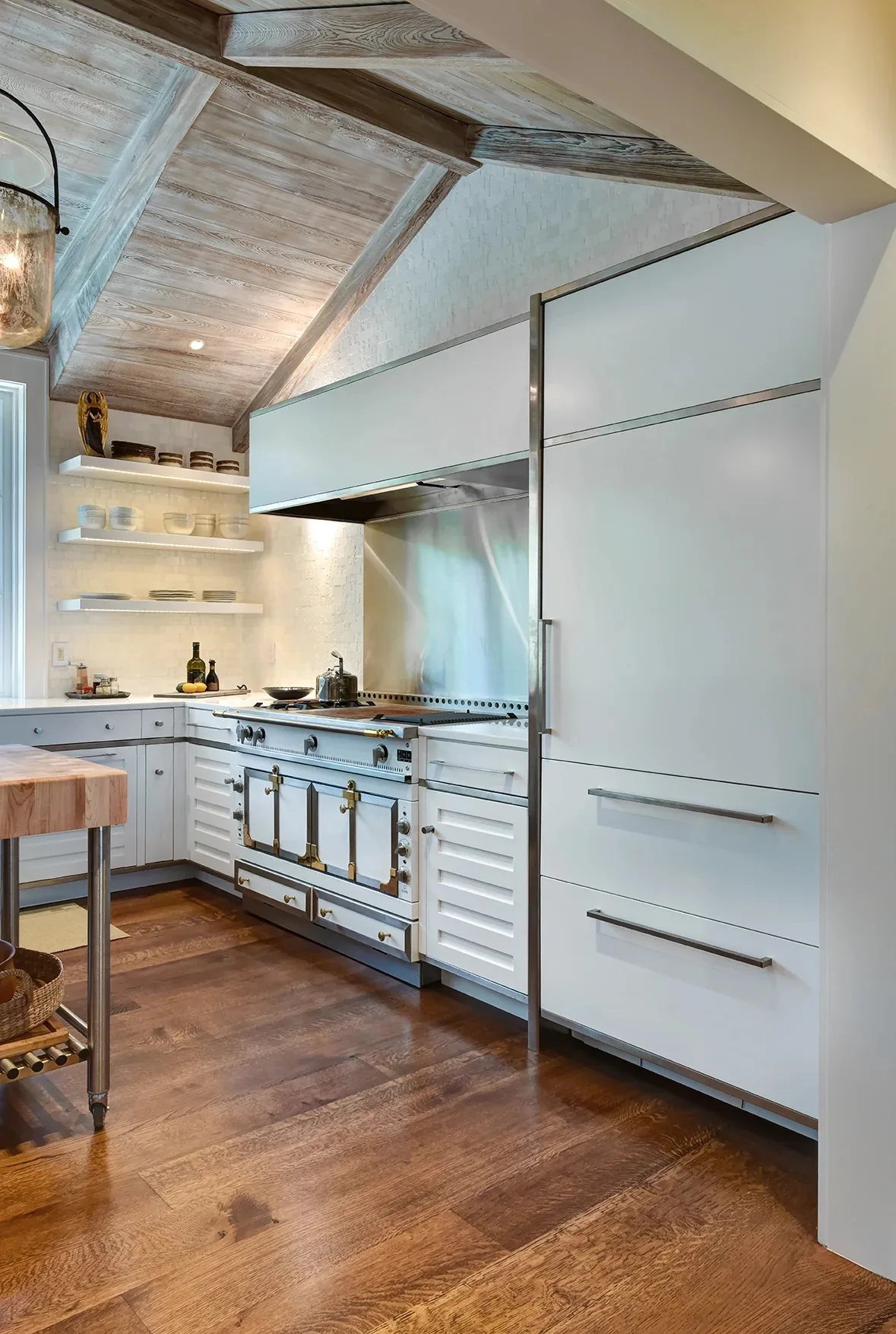 Island Getaway: white cabinetry with stainless steel accents and French range, Kiawah Island